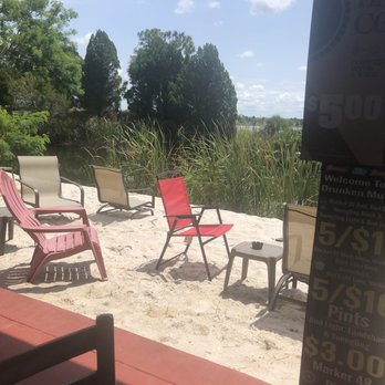 Drunken Mullet - Back patio bar area. - Sports Bars Near Me - Hernando Beach, Florida