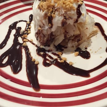 Thai Flavor - Coconut ice cream sandwich with sticky rice. - Thai Near Me - Syracuse, New York Thai Flavor - Coconut ice cream sandwich with sticky rice. - Thai Near Me - Syracuse, New York