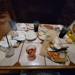 Draft House - Server didn't remove a single thing... including app plates that say empty the entire meal  Empty drinks... cant follow instructions. Ehhj