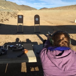 Safe Shooters Firearms Academy - Bench Rest shooting position during an NRA Basic Pistol Shooting Course with Safe Shooters Reno NV