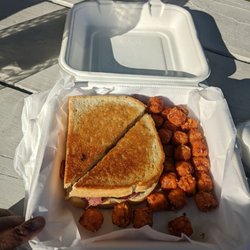 AJ's Uptown Bar & Grill - Reuben sandwich with tots