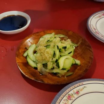Sushi N Noodle by OISI - Cucumber with a vinegar sauce and crunchy topping. First is complimentary.  .$1 additional plates. - Sushi Bars Near Me - Plainfield, Illinois