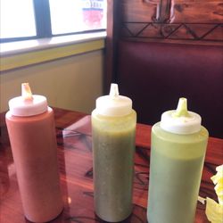 Taco Del Sol - Sauce bottles delivered to your table with your food. Fantastic method that all restaurants should offer.