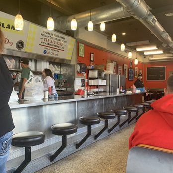 Jackson Coney Island - a woman standing at the counter - New American Near Me - Jackson, Michigan Jackson Coney Island - a woman standing at the counter - New American Near Me - Jackson, Michigan