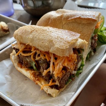 5ive Spice - Braised Short Rib Banh Mi. Braised beef short ribs, Pineapple Chili Coulis  w. Bean sprout and basil (no mayo) - Vietnamese Near Me - Brooklyn, New York