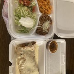 El Buen Sazon - Shrimp Chimichanga with sides of rice, beans, and salad with pico de gallo.