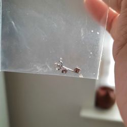 Joseph Jacob Jewelers - single earring stud with dirt inside bag