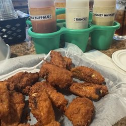 Hideaway Bar & Grill - Wings and "bucket of sauce"