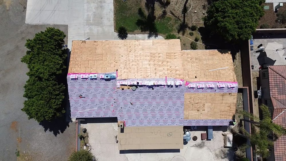 Slide of Sandoval Roofing