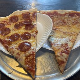Lunch special number two. One cheese and one pepperoni pizza, and a drink. Lunch special number two. One cheese and one pepperoni pizza, and a drink.