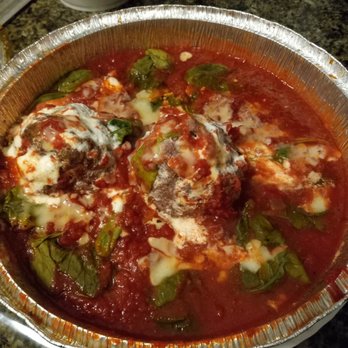 PieZano Pizzeria - Meatball appetizer on spinach with their fabulous sauce - Italian Near Me - Titusville, Florida PieZano Pizzeria - Meatball appetizer on spinach with their fabulous sauce - Italian Near Me - Titusville, Florida