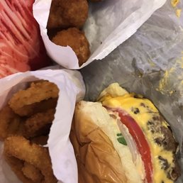 Deluxe cheeseburger, onion rings, & mushrooms Deluxe cheeseburger, onion rings, & mushrooms