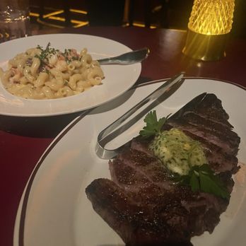 Drake's - Dry Aged Delmonico Ribeye with a side of lobster Mac and cheese - New American Near Me - Dallas, Texas