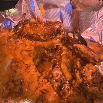 Corner Bar - Smokey Bacon Ranch wings. Huge chunks of bacon and a creamy delicious sauce - Dive Bars Near Me - Austinburg, Ohio