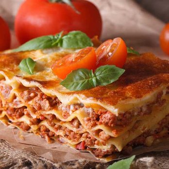 Supreme Meats - a lasagna with tomatoes and basil - Meat Shops Near Me - Stuart, Florida