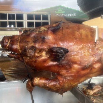 El Rancho Original - Pig on rotisserie - Barbeque Near Me - Cayey, Puerto Rico El Rancho Original - Pig on rotisserie - Barbeque Near Me - Cayey, Puerto Rico