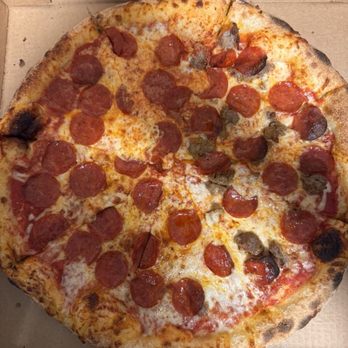 Flippers Pizza - All pepperoni and half with sausage pizza. - Italian Near Me - Lady Lake, Florida Flippers Pizza - All pepperoni and half with sausage pizza. - Italian Near Me - Lady Lake, Florida