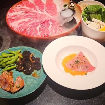 Prime Hot Pot - Wagyu Platter, Wood ear mushroom, edamame and pork. Vegetables and wagyu carpaccio - Hot Pot Near Me - Tustin, California Prime Hot Pot - Wagyu Platter, Wood ear mushroom, edamame and pork. Vegetables and wagyu carpaccio - Hot Pot Near Me - Tustin, California