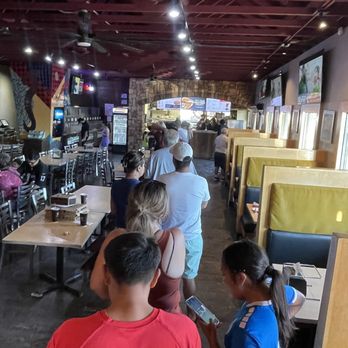 Me-n-Ed's Pizzeria - ows a line of people waiting to order food - Pizza Near Me - Selma, California Me-n-Ed's Pizzeria - ows a line of people waiting to order food - Pizza Near Me - Selma, California