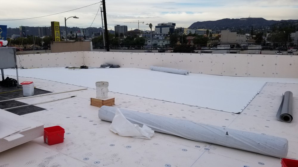 Slide of Maverick Roofing