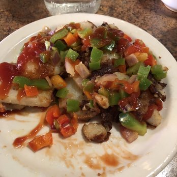 Huckleberry's - Raw peppers and onions dumped on top of my potatoes. - Cajun/Creole Near Me - Benicia, California Huckleberry's - Raw peppers and onions dumped on top of my potatoes. - Cajun/Creole Near Me - Benicia, California