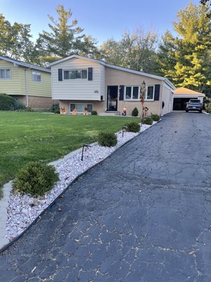 Landscaping Transformation - This is one of my clients front yard. She recently bought her home and was not happy with how the previous owner left the landscaping... it wasn't well maintenanced over the years. After discussing the best options for her and cost factors, we started our work. As you can see everything turned out beautiful!