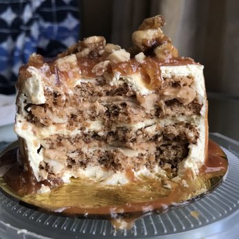 Manam Cafe - Cross section of Toasted Walnut Caramel Sans Rival -- layers of Dacquoise and Buttercream! - Filipino Near Me - Muntinlupa City, NCR