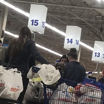 Meijer - A dog in a shopping cart (which is against health code) trying to jump out of the cart at my dog - Grocery Near Me - Charlotte, Michigan