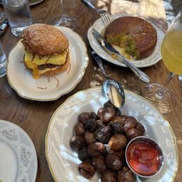 Breakfast Sandwich, Potatoes, Cornbread, Mimosa Breakfast Sandwich, Potatoes, Cornbread, Mimosa