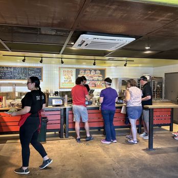 Hopdoddy Burger Bar - people standing at the counter - Burgers Near Me - Austin, Texas Hopdoddy Burger Bar - people standing at the counter - Burgers Near Me - Austin, Texas