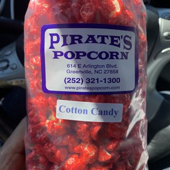 Pirates Popcorn - a person holding a bag of popcorn - Popcorn Shops Near Me - Greenville, North Carolina Pirates Popcorn - a person holding a bag of popcorn - Popcorn Shops Near Me - Greenville, North Carolina
