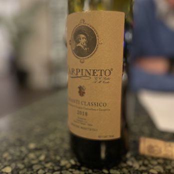 ItalX - a bottle of wine on a table - Italian Near Me - Lexington, Kentucky ItalX - a bottle of wine on a table - Italian Near Me - Lexington, Kentucky