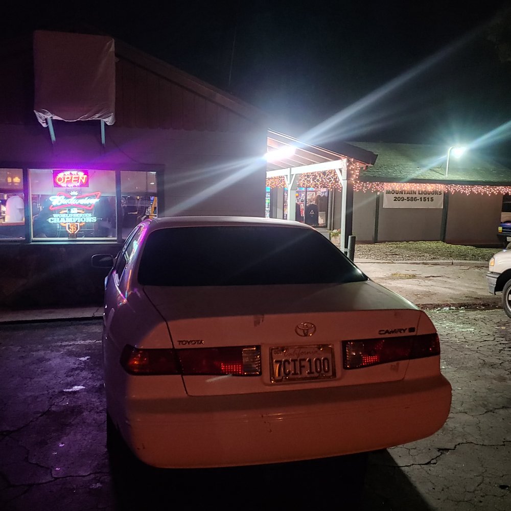 Ed's Cocktail Lounge - a car parked in front of a restaurant - Lounges Near Me - Twain Harte, California