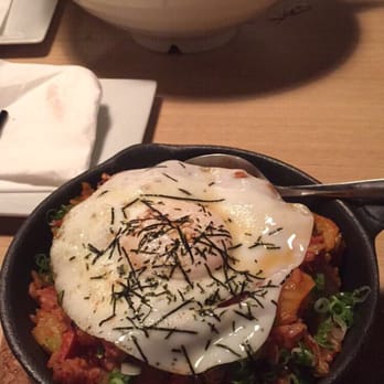 Tong Sake House - Kimchi bacon bowl, ramen in the background - Korean Near Me - Poway, California Tong Sake House - Kimchi bacon bowl, ramen in the background - Korean Near Me - Poway, California