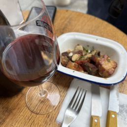 Can't remember name, but staff recommended both wine and this pork dish Can't remember name, but staff recommended both wine and this pork dish