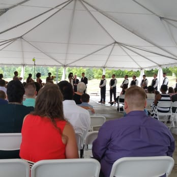 Lake Lyndsay Lodge - The ceremony in the tent. - Venues & Event Spaces Near Me - Hamilton, Ohio Lake Lyndsay Lodge - The ceremony in the tent. - Venues & Event Spaces Near Me - Hamilton, Ohio