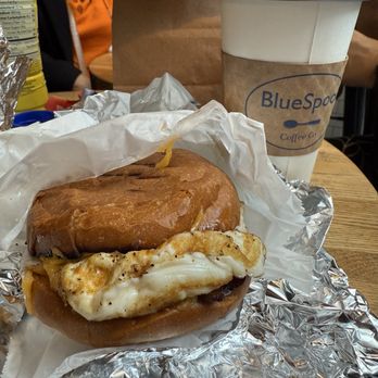 Blue Spoon Coffee - Bacon Egg and Cheddar Sandwich on a Brioche Bun - Cafes Near Me - New York, New York Blue Spoon Coffee - Bacon Egg and Cheddar Sandwich on a Brioche Bun - Cafes Near Me - New York, New York