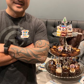 It's All About The Cake - He was so happy! Our guests loved the "Dhennis" dessert tower! - Bakeries Near Me - Dana Point, California