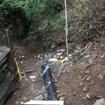 All Access Construction - Debris by creek. - General Contractors Near Me - Richmond, California