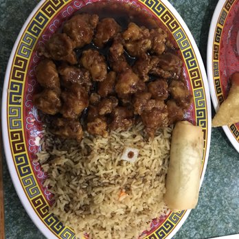 New China - General Tso and fried rice with a spring roll. - Chinese Near Me - Lebanon, Ohio