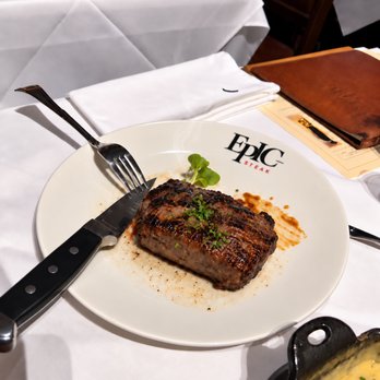 EPIC Steak - Steak on an EPIC plate. Photography by Imma Martiello. AI-edited framing/branding; added steam; people removed. - Steakhouses Near Me - San Francisco, California EPIC Steak - Steak on an EPIC plate. Photography by Imma Martiello. AI-edited framing/branding; added steam; people removed. - Steakhouses Near Me - San Francisco, California