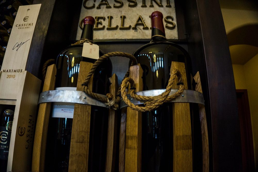 Cassini Cellars - two bottles of wine on display - Wineries Near Me - Oliver, British Columbia Cassini Cellars - two bottles of wine on display - Wineries Near Me - Oliver, British Columbia