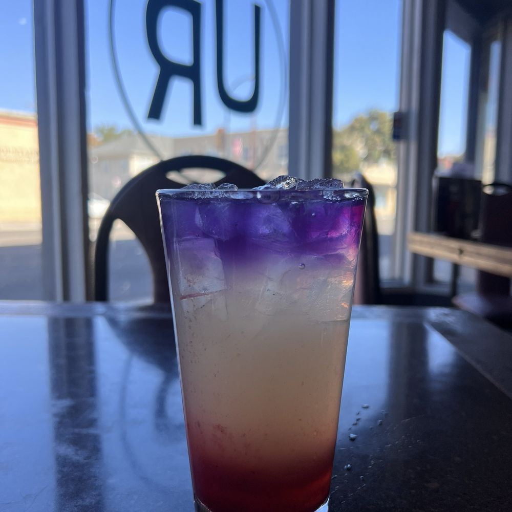 The Upper Room Kitchen - a purple and red drink on a table - New American Near Me - Tracy, California The Upper Room Kitchen - a purple and red drink on a table - New American Near Me - Tracy, California