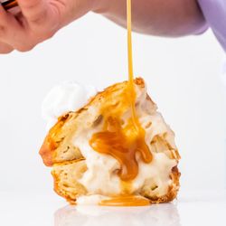 SnoCorner - Bananas Foster Beignets: Banana pudding filled, cinnamon & powdered sugar, caramel drizzle and whipped cream