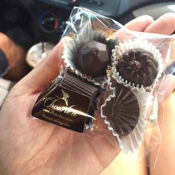 Choco le'a - Yuzu, caramel 'alaea sea salt, yamazaki, and rum raisin. Can't wait to eat it. - Chocolatiers & Shops Near Me - Honolulu, Hawaii