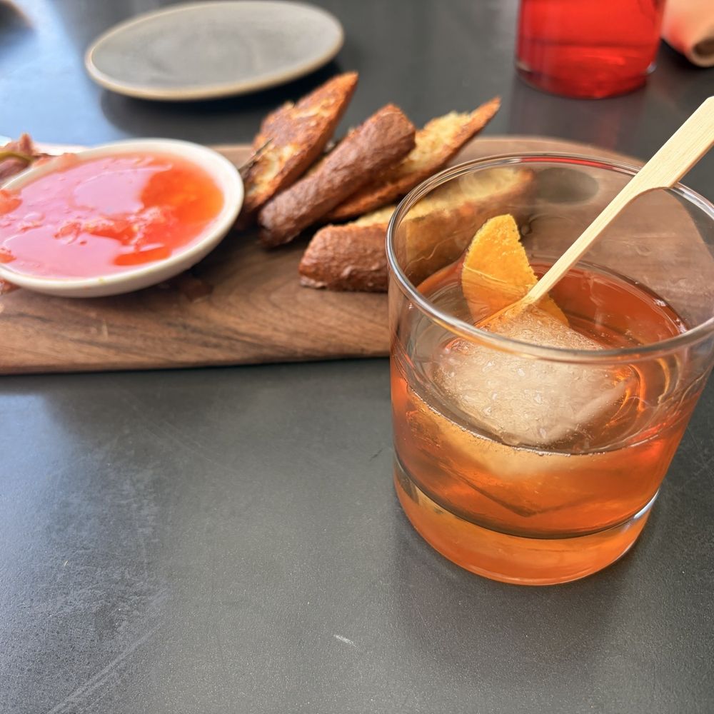 Ultreia - Old fashioned with their signature bourbon Pan con Tomate with Jamon Siberria - Tapas Bars Near Me - Denver, Colorado Ultreia - Old fashioned with their signature bourbon Pan con Tomate with Jamon Siberria - Tapas Bars Near Me - Denver, Colorado