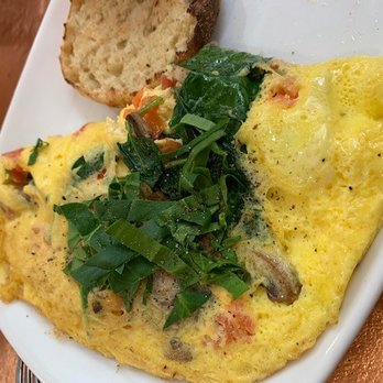 Another Broken Egg Cafe - Goat cheese & Spinach omelette and ask for their homemade salsa. YUM - Breakfast & Brunch Near Me - Clearwater Beach, Florida
