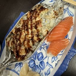 Salmon nigiri and scallop dynamite rolll
