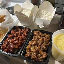 Crab Rangoon, Orange Chicken, Sesame Chicken, White Rice, Egg Drop Soup (with wonton chips to go on top!) - All Delicious!