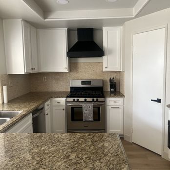 Angelo Building Group - a kitchen with granite countertops - General Contractors Near Me - Beaumont, California Angelo Building Group - a kitchen with granite countertops - General Contractors Near Me - Beaumont, California